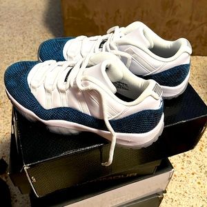 Brand new never used. Air jordan retro low 11 navy blue snakeskin